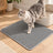 Katze auf der Katzenstreumatte Korn